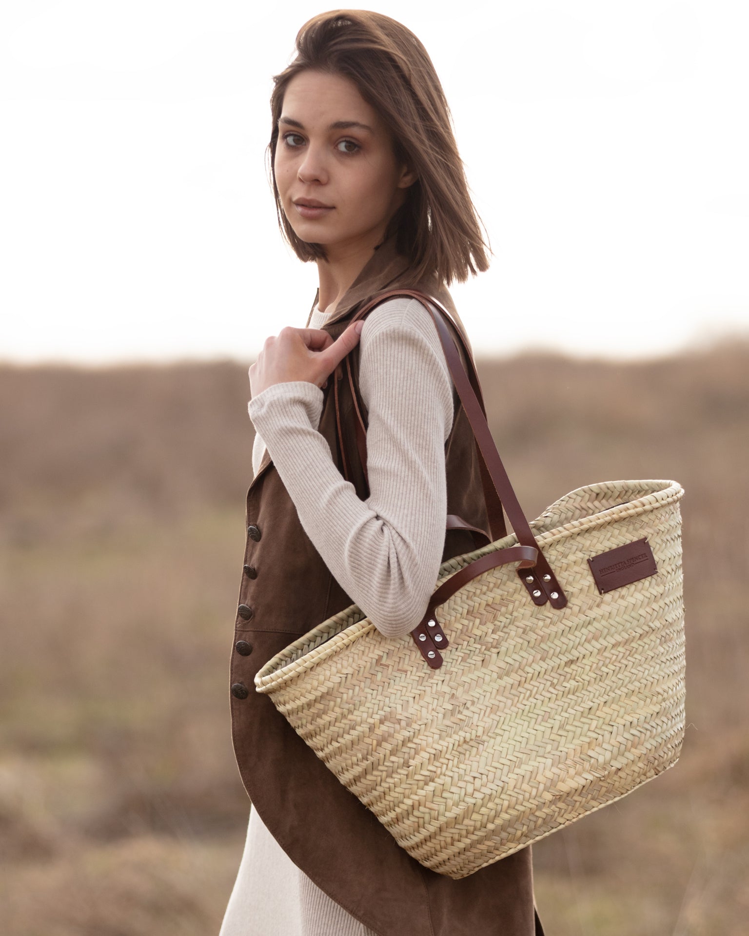 Why Basket Bags – Especially Henrietta Spencer – Are the Ultimate Holiday Essentia
